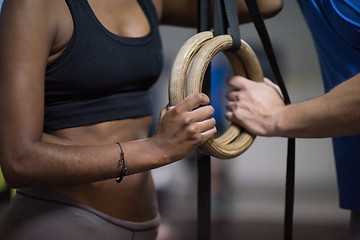 Image showing Portrait of multiethnic couple  after workout at gym