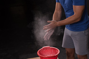 Image showing Gym Chalk Magnesium Carbonate hands clapping man