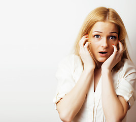 Image showing young blond woman on white backgroung gesture thumbs up, isolate