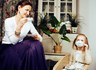 Image showing young mother with daughter at luxury home interior vintage