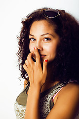 Image showing young happy smiling latin american teenage girl emotional posing on white background, lifestyle people concept 