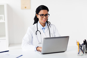 Image showing female doctor with laptop at hospital