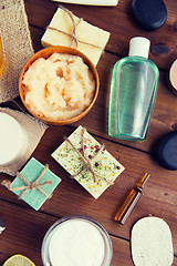 Image showing close up of body care cosmetic products on wood