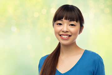 Image showing happy smiling young asian woman