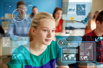 Image showing teenage girl with students at school lesson