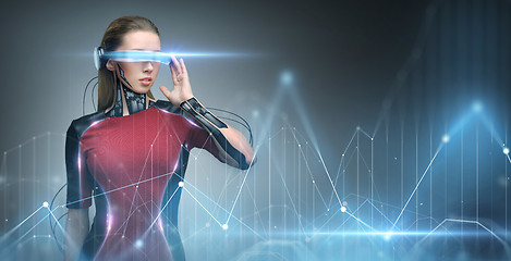 Image showing woman in virtual reality glasses and microchip