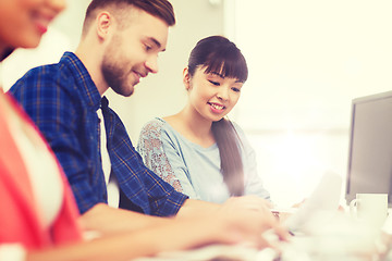 Image showing happy creative team or students working at office