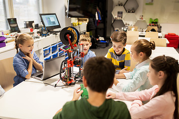 Image showing happy children with 3d printer at robotics school