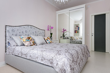 Image showing elegant bedroom in soft light colors