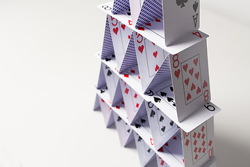 Image showing house of playing cards over white background