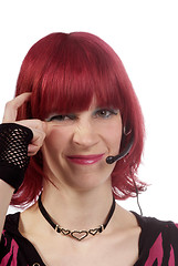 Image showing woman with headset uncertain