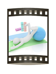 Image showing 3d man on a karemat with fitness ball. 3D illustration. The film