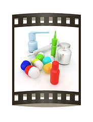 Image showing Syringe, tablet, pill jar. 3D illustration. The film strip