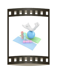 Image showing 3d man on a karemat with fitness ball. 3D illustration. The film