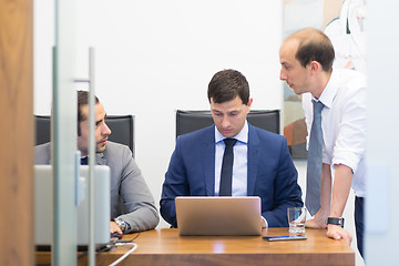 Image showing Corporate businessteam working in modern office.