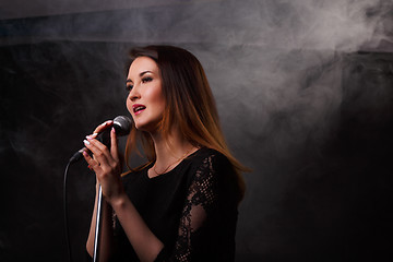 Image showing Studio photo of singing girl