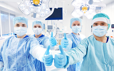 Image showing group of surgeons in operating room at hospital