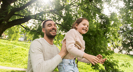 Image showing happy family having fun in summer park