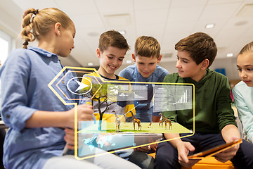 Image showing group of happy children with tablet pc at school