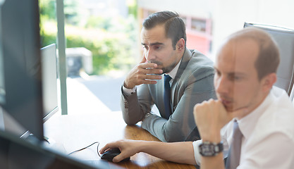 Image showing Business team analyzing data at business meeting.