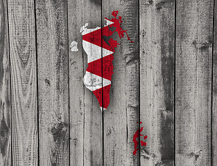 Image showing Map and flag of Bahrain on weathered wood