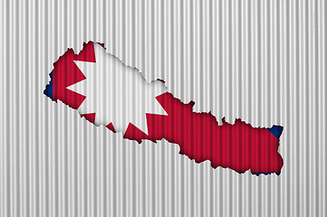 Image showing Map and flag of Nepal on corrugated iron