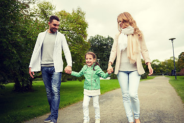 Image showing happy family walking in summer park