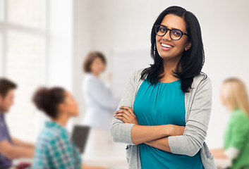 Image showing happy smiling young indian woman in glasses