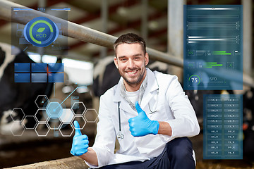 Image showing veterinarian and cows in cowshed on dairy farm