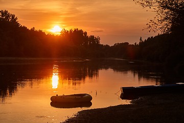 Image showing Sunset over a river