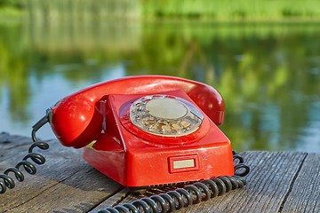 Image showing Old telephone in nature