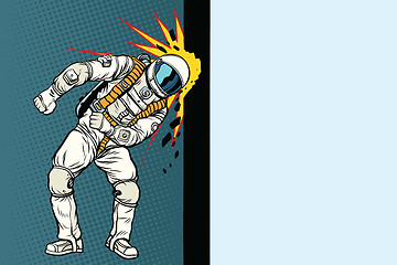 Image showing Cosmonaut knocks head on the wall. Dream of mankind