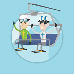 Image showing Two happy skiers using cableway at ski resort.