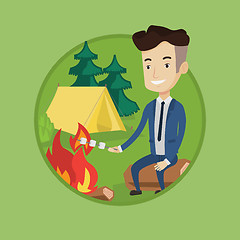 Image showing Businessman roasting marshmallow over campfire.