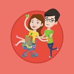 Image showing Couple of friends riding by shopping trolley.