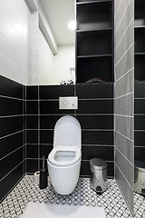 Image showing Modern black and white toilet