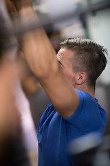 Image showing man doing dipping exercise