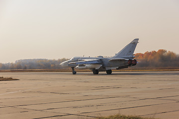 Image showing Military jet bomber Su-24 Fencer afterburner takeoff