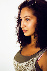 Image showing young happy smiling latin american teenage girl emotional posing on white background, lifestyle people concept 