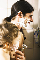 Image showing Portrait of son and father enjoying while shaving together, lifestyle people concept, happy family closeup