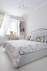 Image showing elegant bedroom in soft light colors