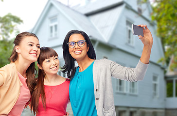 Image showing international group of happy women taking selfie