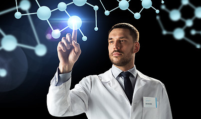 Image showing doctor or scientist in white coat with molecules