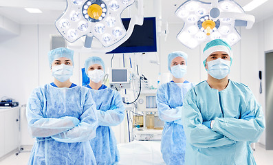 Image showing group of surgeons in operating room at hospital