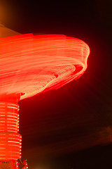 Image showing Local State Fair Carnival Ride Long Exposure Red Streaks