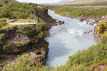 Image showing Hraunfossar Iceland, woman watching