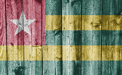 Image showing Flag of Togo on weathered wood