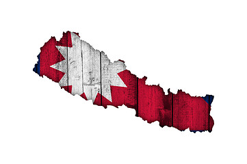 Image showing Map and flag of Nepal on weathered wood