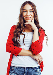 Image showing young pretty teenage hipster girl posing emotional happy smiling on white background, lifestyle people concept 