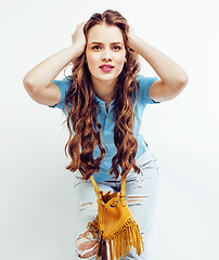 Image showing young pretty long hair woman happy smiling isolated on white background, wearing cute tiny fashion handbag, lifestyle people concept